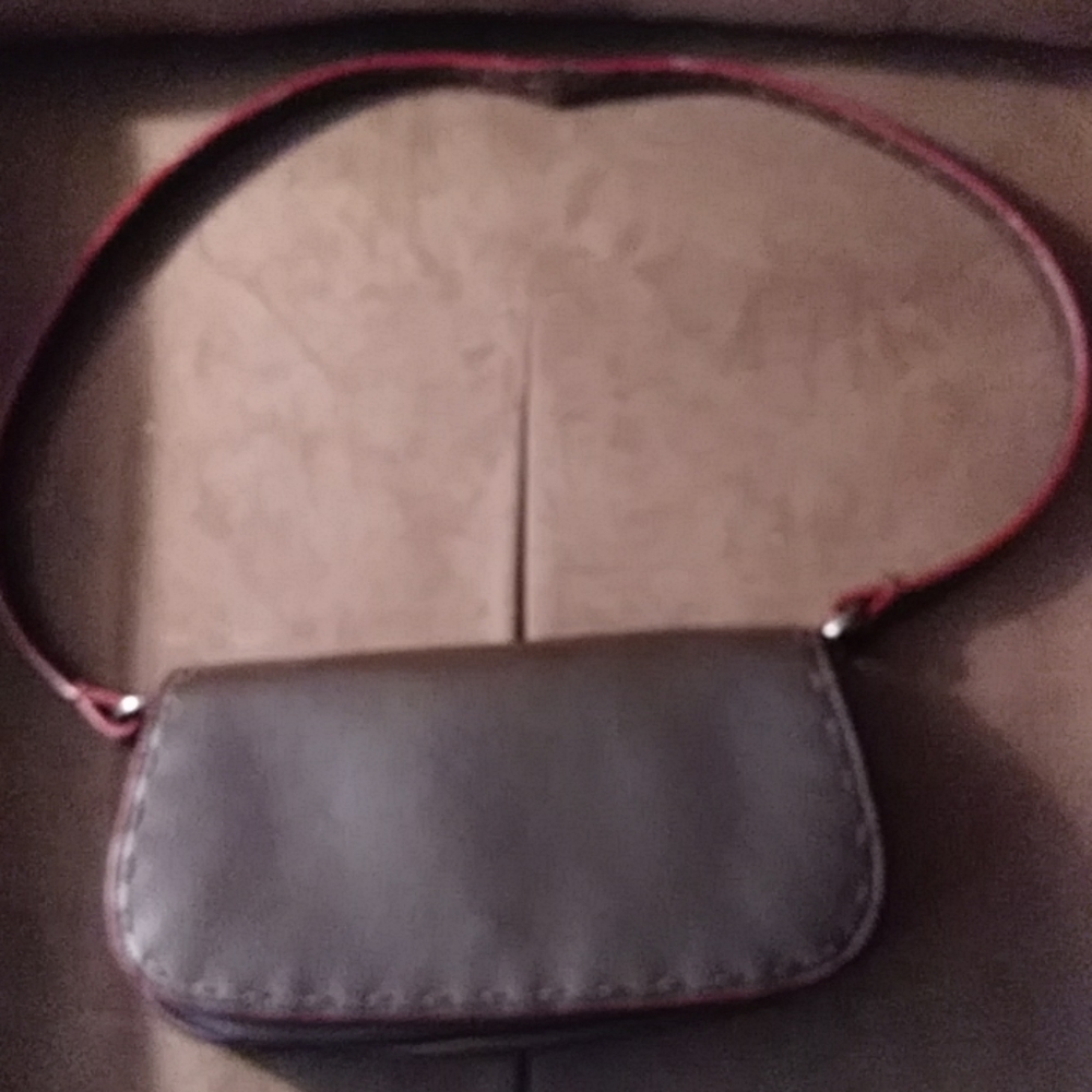 Nine West brown shoulder purse with cool hot pink interior and a mirror